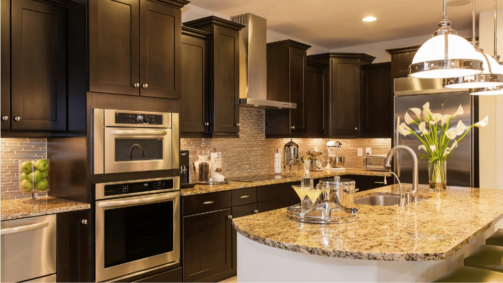 Luxury kitchen with large-format porcelain slab surfaces and custom cabinetry